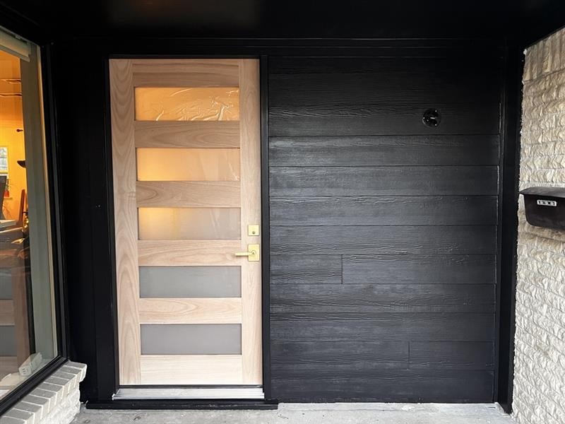 Entryway after — new modern door with sidelite and painted shiplap
