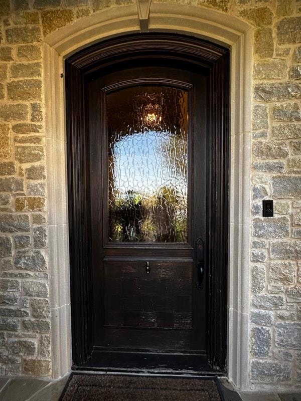 Front door before — faded, weathered finish